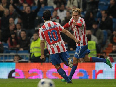 Forlan a Aguero