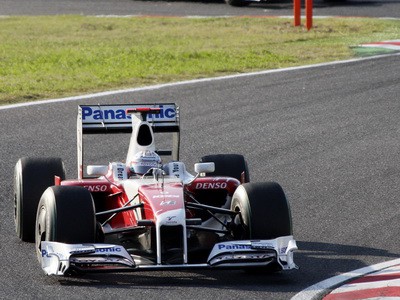 Jarno Trulli a Lewis Hamilton