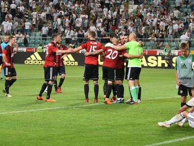 Na snímke radosť hráčov Spartaka Trnava po víťaznom prvom zápase 2. predkola Ligy majstrov Legia Varšava -  FC Spartak Trnava.