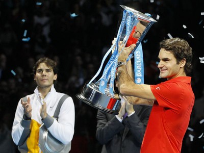Federer s trofejou, Nadal