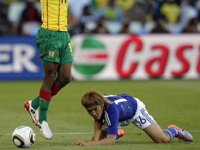 Jean Makoun a Yoshito Okubo