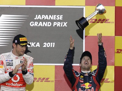 Jenson Button a Sebastian Vettel