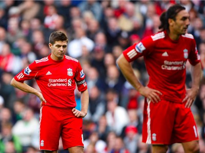 Smutní hráči Liverpoolu: Steven Gerrard a Sotirios Kyrgiakos 
