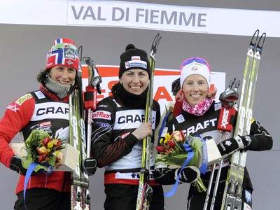 Marit Björgenová , Justyna Kowalczyková a Therese Johaugová