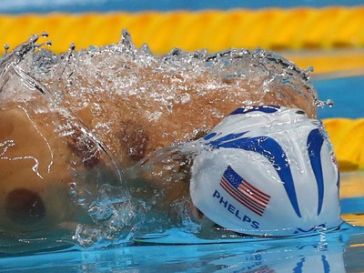 Michael Phelps so stopami po bankovaní