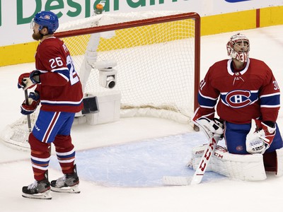 Carey Price a Jeff Petry po vstrelenom góle do siete Montrealu