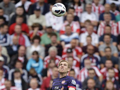 Per Mertesacker a Peter Crouch