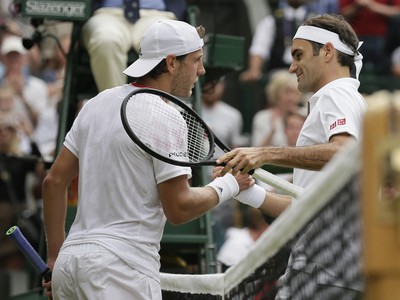 Lucas Pouille a Roger Federer