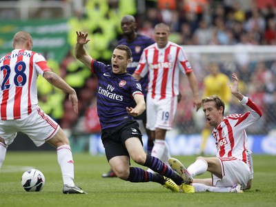 Thomas Vermaelen, Peter Crouch a Andy Wilkinson