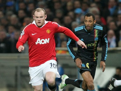 Rooney a Cisse