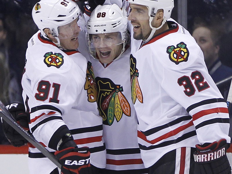 Patrick Kane (88), Brad Richards a Michal Rozsival (32)