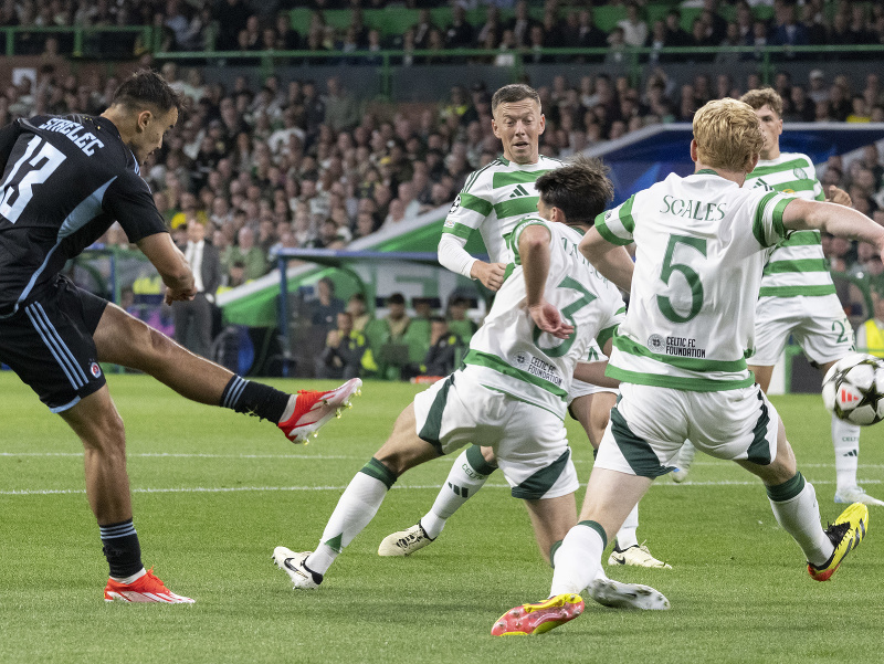Na snímke zľava Dávid Strelec zo Slovana, hráči Celticu Greg Taylor a Liam Scales