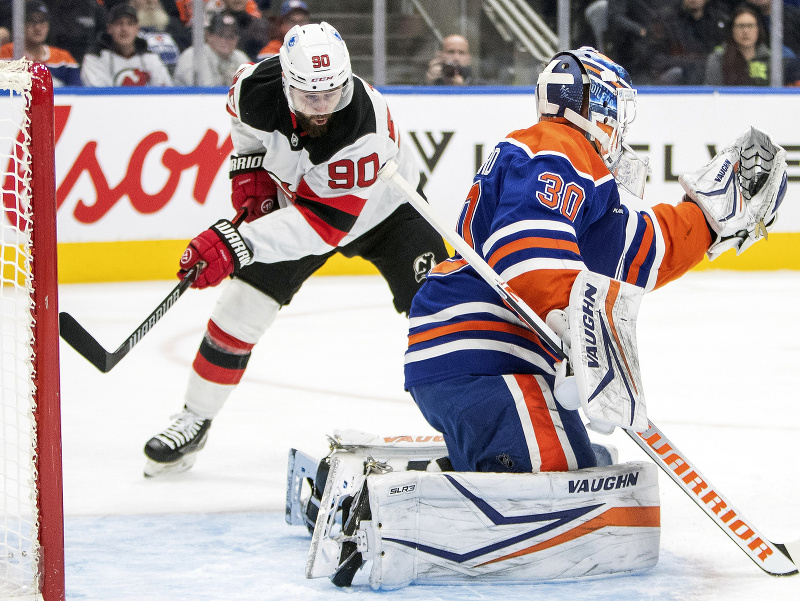Tomáš Tatar a Calvin Pickard