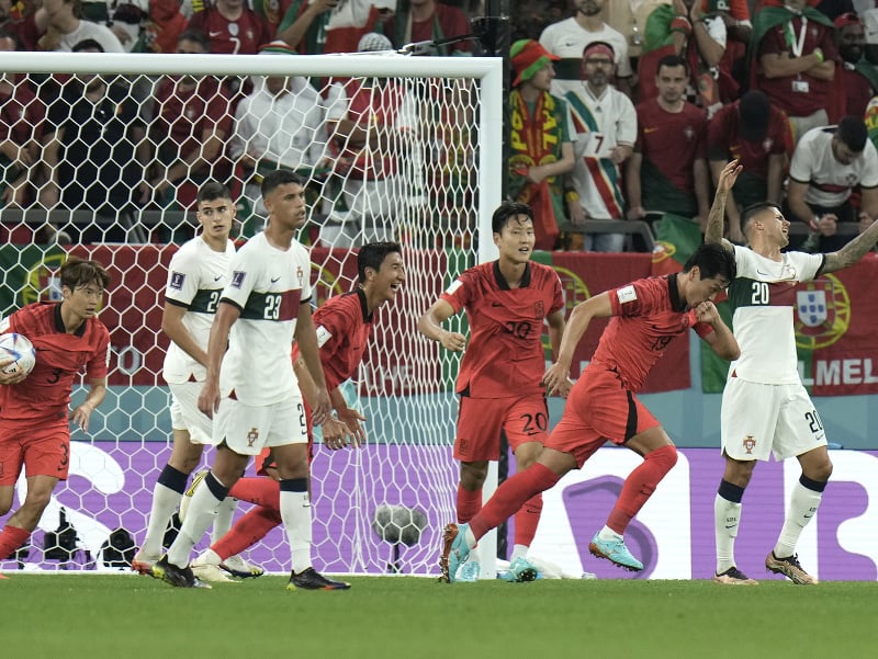 Kórejskí futbalisti sa radujú z gólu