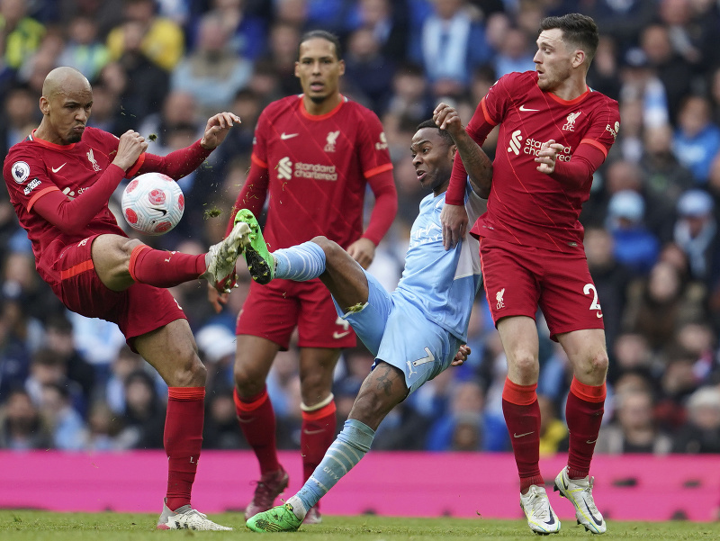 Fabinho a Raheem Sterling v súboji