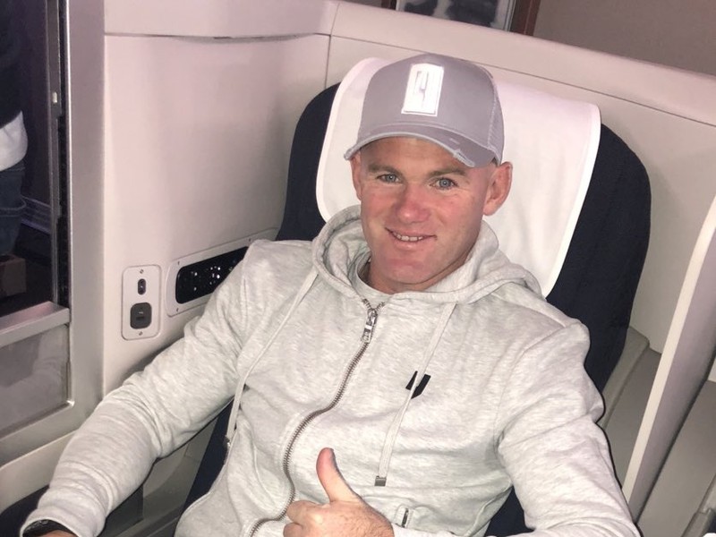 Wayne Rooney počas letu do USA