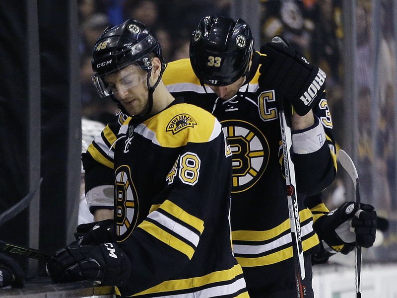 Colin Miller a Zdeno Chára